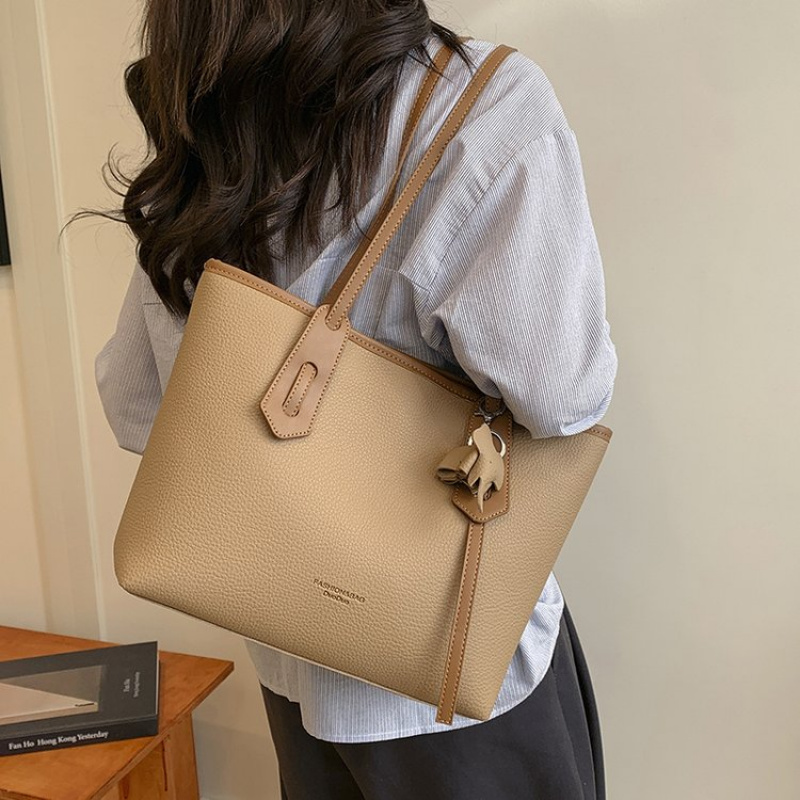 Borsa fasciatoio di design tre - Luxury Bags Must Have recensione e prezzo