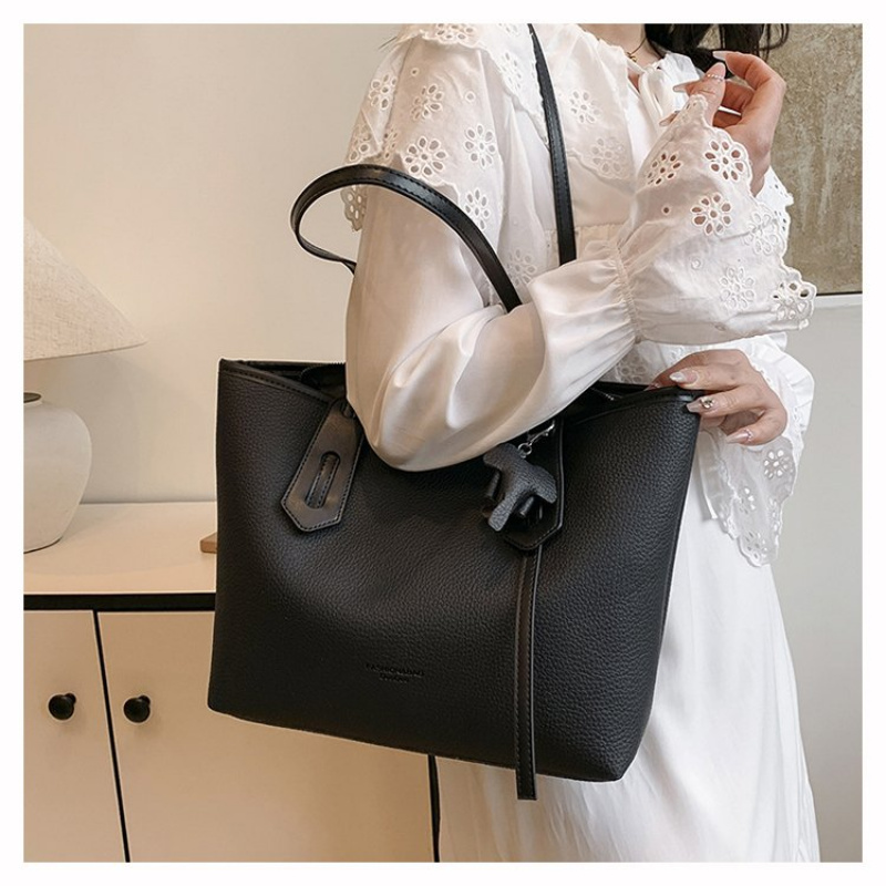 Borsa fasciatoio di design tre - Luxury Bags Must Have recensione e prezzo