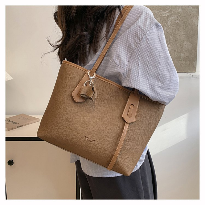 Borsa fasciatoio di design tre - Luxury Bags Must Have recensione e prezzo