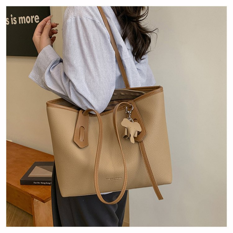 Borsa fasciatoio di design tre - Luxury Bags Must Have recensione e prezzo